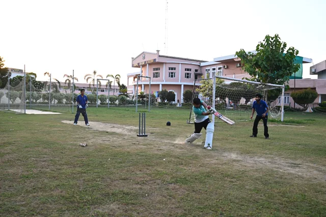 A batter playing a shot during cricket practice
