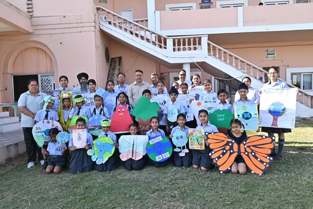 Children displaying creative costumes in the school courtyard