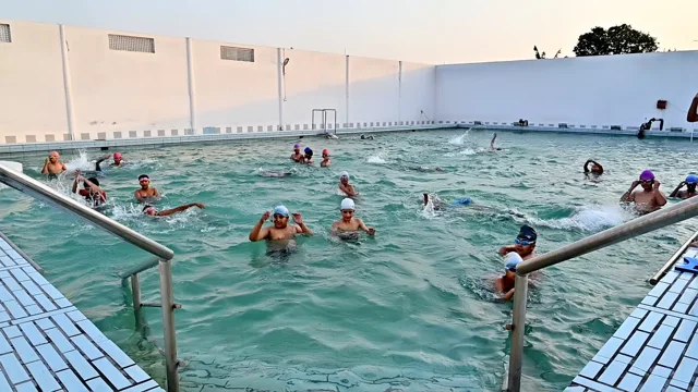 A wide view of the swimming pool during a session